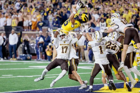 Michigan escapes ‘epic loss’ on Hail Mary